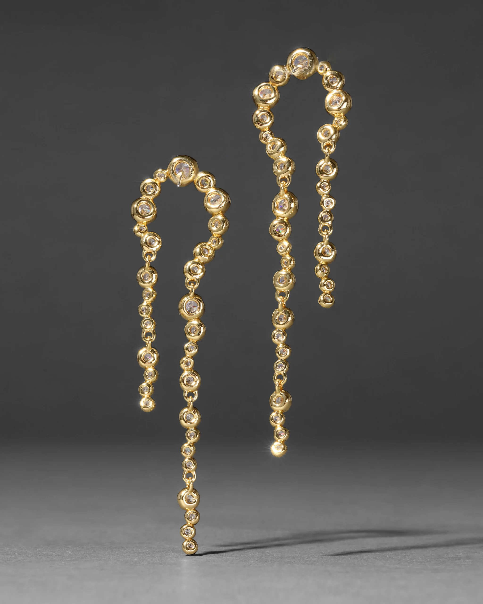 Asterales Gold Arched Long Earring